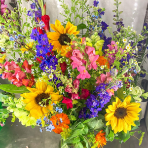 An over the top floral arrangement by wildly native flower farm