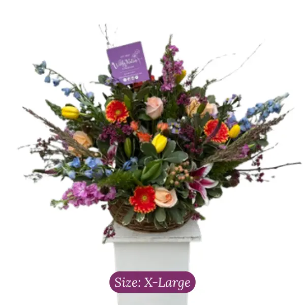 X-Large Colorful Funeral Basket Arrangement by Wildly Native Flower Farm
