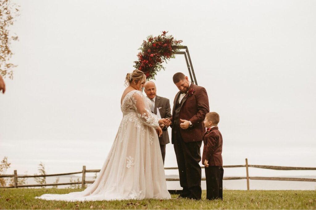 coffin arch with bride and groom