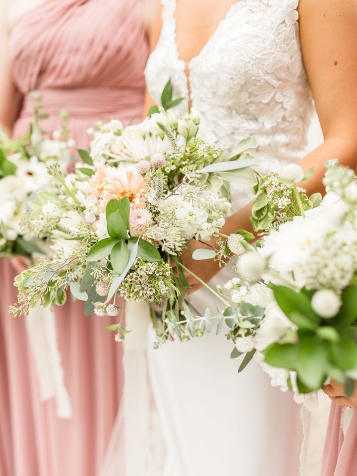 bridesmaid bouquets with dresses and ribbon