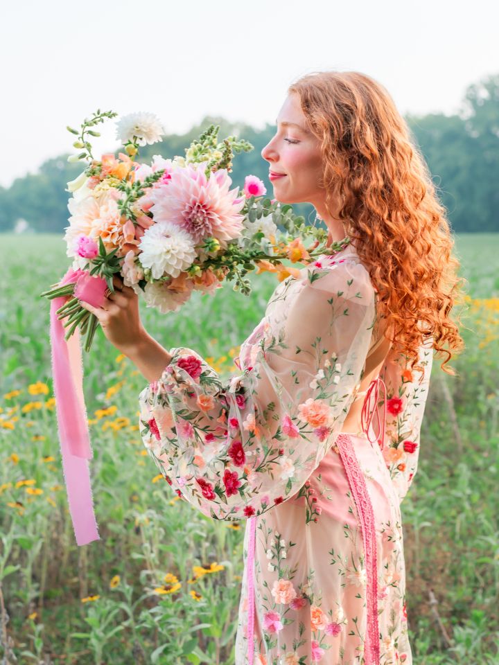 styled shoot bouquet with pastel wildflowers and colorful ribbon