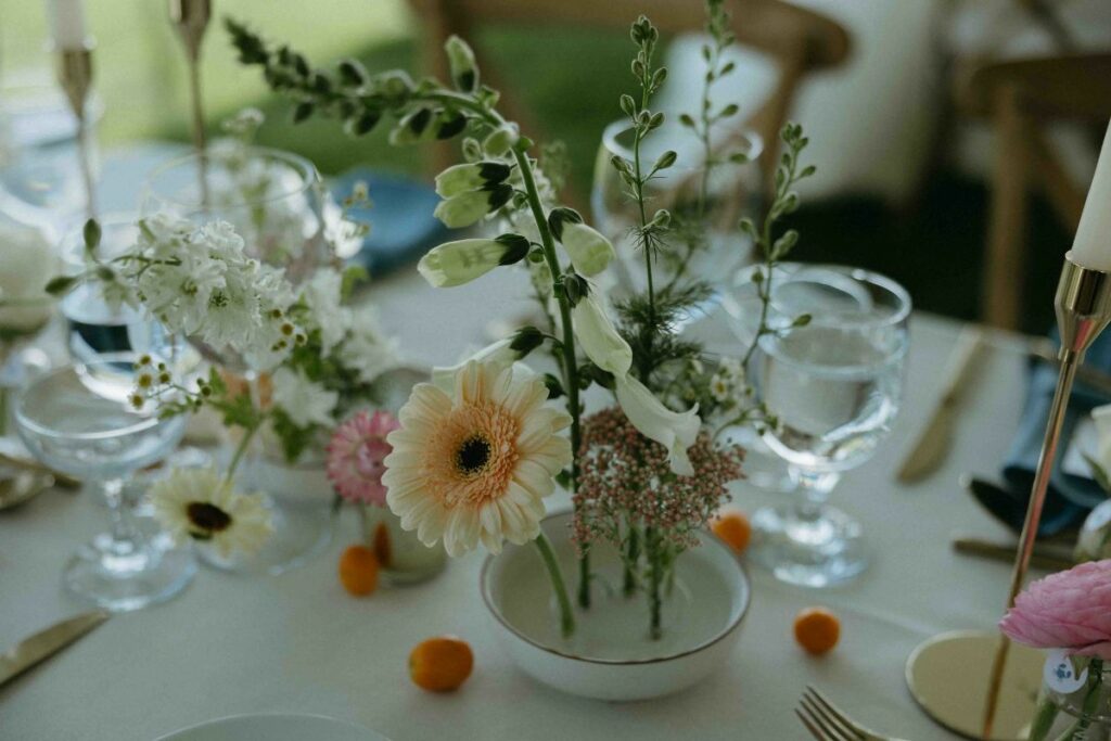 reception with floral frogs