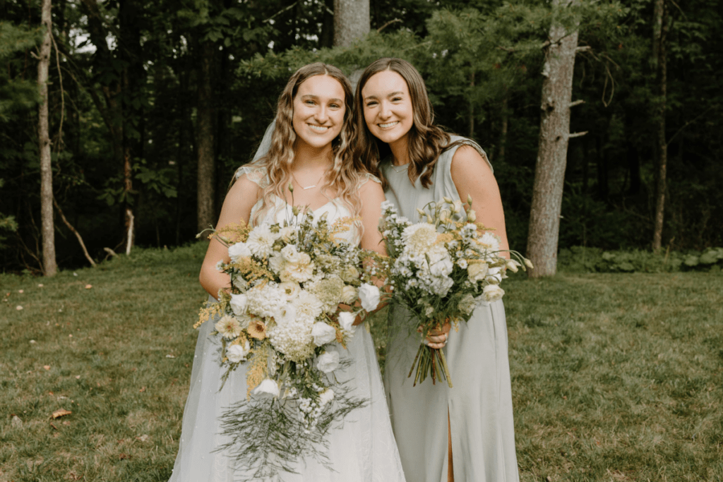 white and yellow summer cascading bouquet with greenery mixed in
