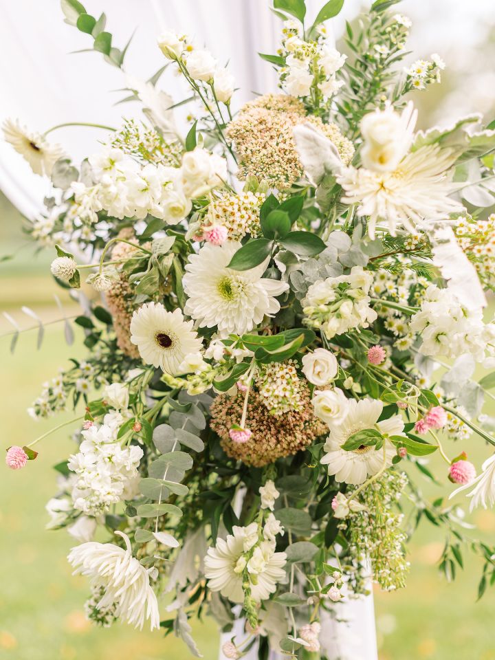 wedding arch with white and pink florals
