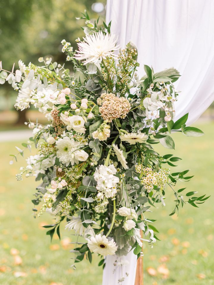 white and pink flowers with greenery