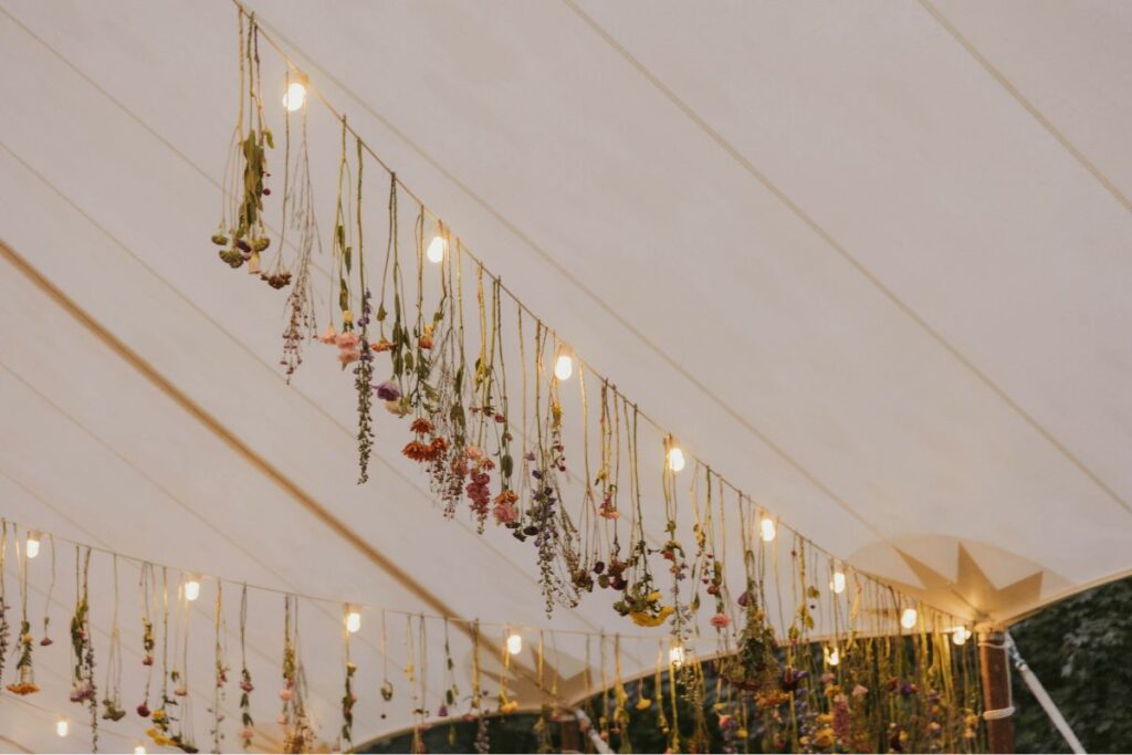 floral installation with colorful flowers bistro lighting