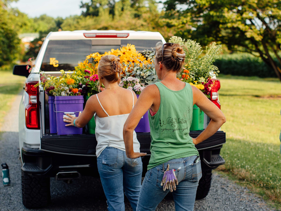 Liza and Lizzy loading up the truck at Wildly Native Flower Farm
