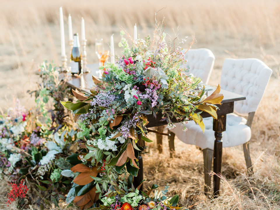 styled shoot bouquet with pastel wildflowers and colorful ribbon