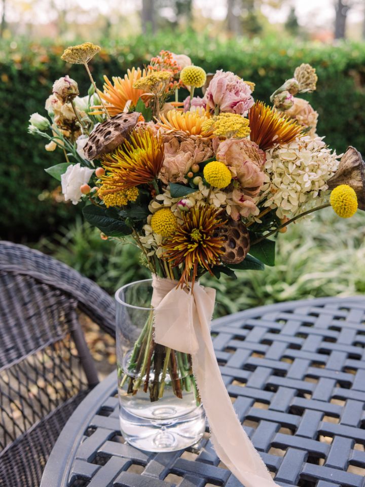 bridal bouquet made of fresh and dried flowers in vase