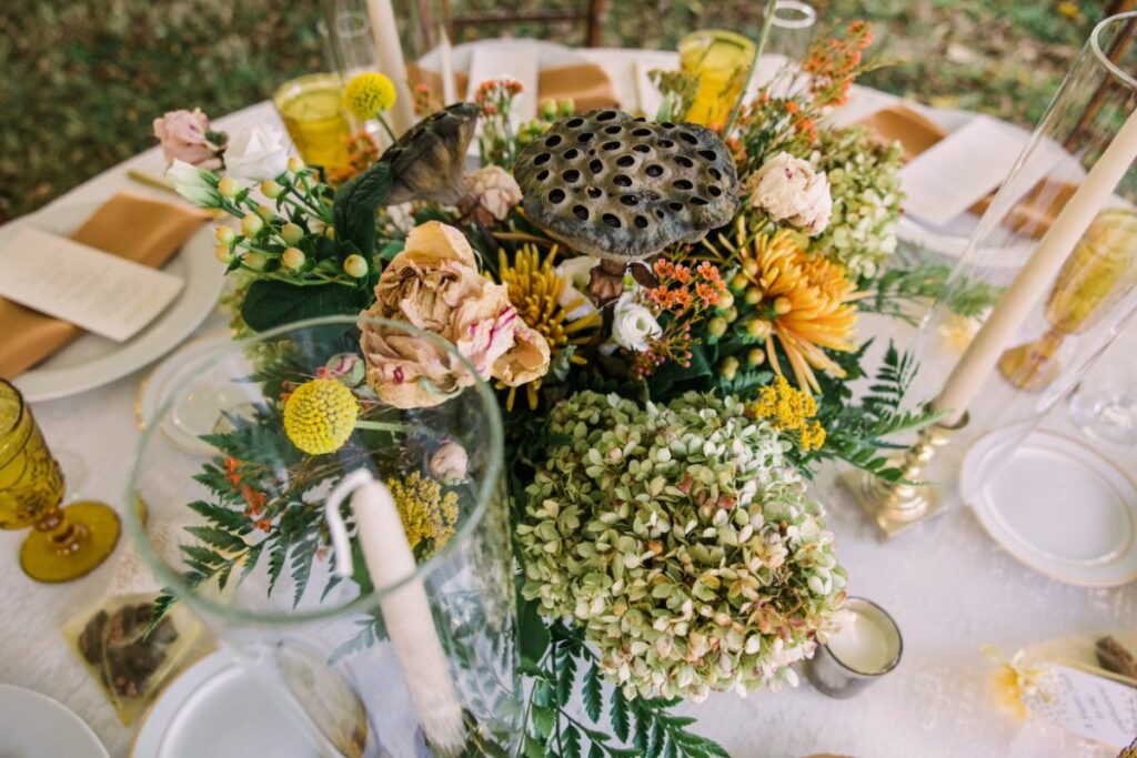 round table with compote and taper candles