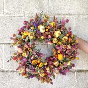 Bright and colorful dried flower wildflower wreath.