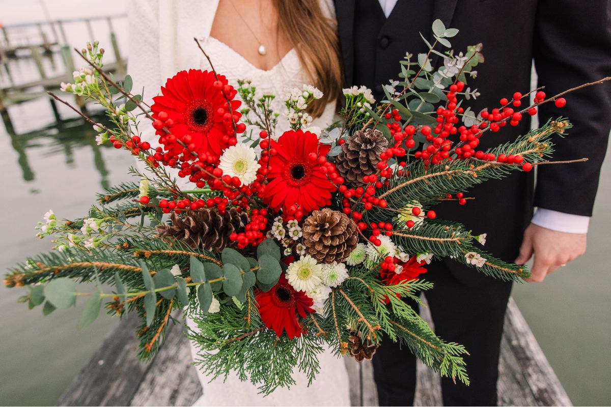 Christmas Bouquet Close up of bridal bouquet in red, white, and evergreens.