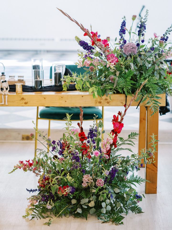 Large jewel tone wedding flower arrangements