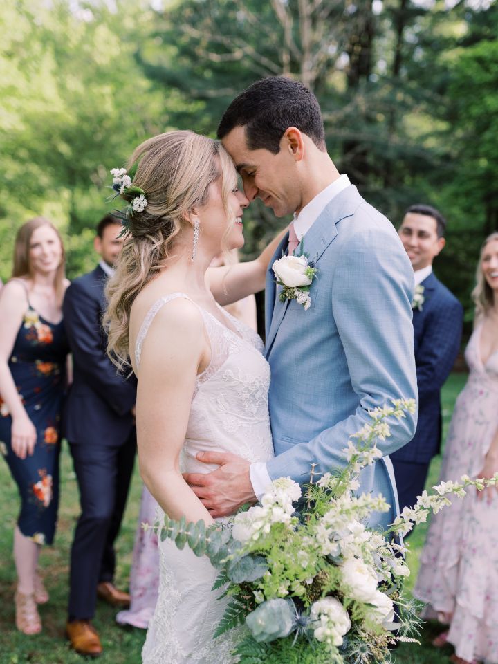 Couple pose for a wedding photo.