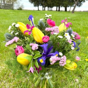 Mother's Day Flowers in a vase sitting in the grass