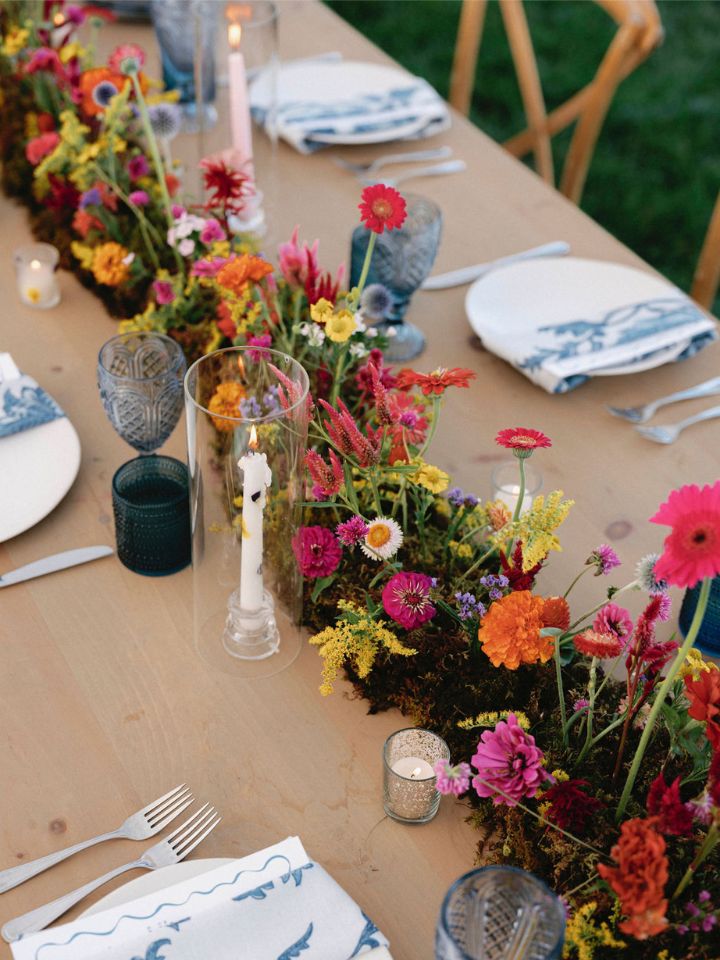 Detail view of a Wildly Native Flower Farm meadow flower style moss runner centerpiece.