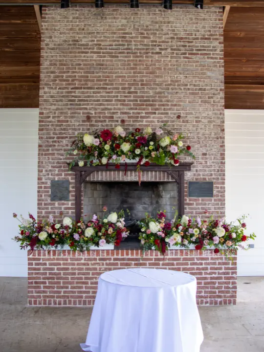 brickfloralinstallation Floral installation on a tree for a wedding ceremony by Wildly Native Flower Farm
