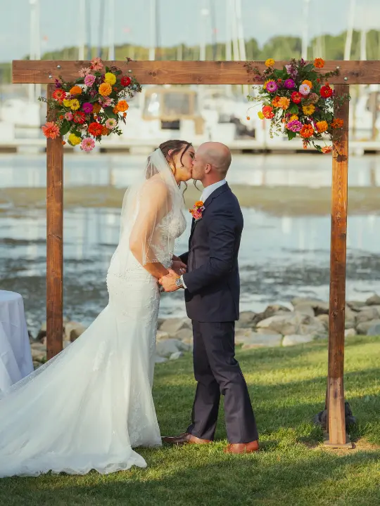 brightcolorfularchflorals Bright colorful florals on a wooden arch