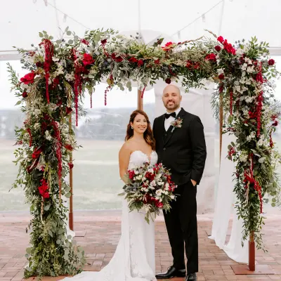 chuppah_featured Red with greenery chuppah