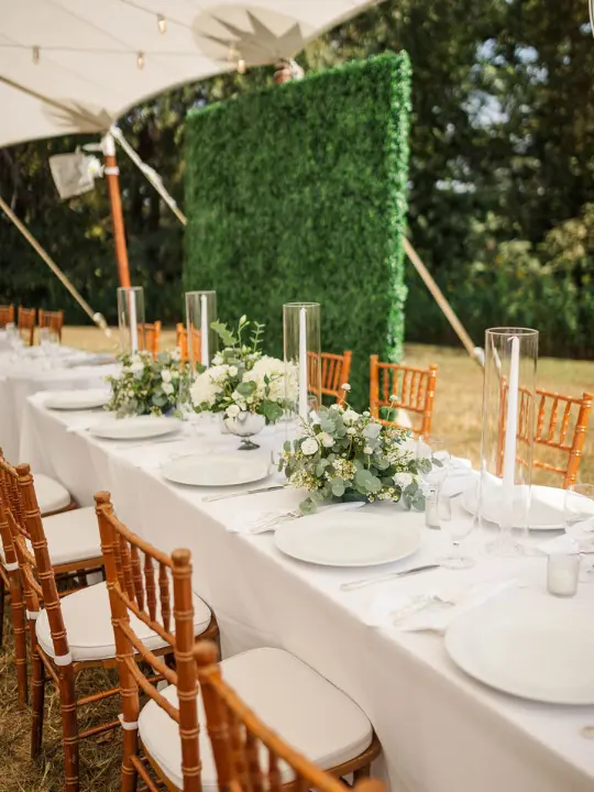 floralrarrangementswhitegreen White florals with greenery tabletop flower arrangements