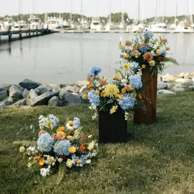 pedestals_featured White Arch with Bright PInk and Purple Florals
