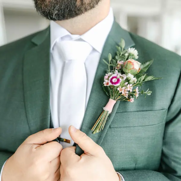 Pin On Boutonniere on a Sage Green Suit