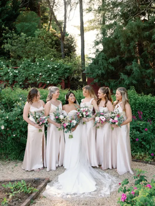 springpastelpacahousebridesmaids Bride and her bridesmaids carrying spring pastel bouquets