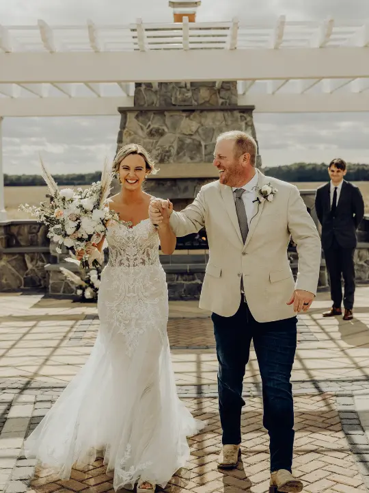 vanderwendeacresbrideandgroom Bride and groom celebrating after ceremony at Vanderwende Acres