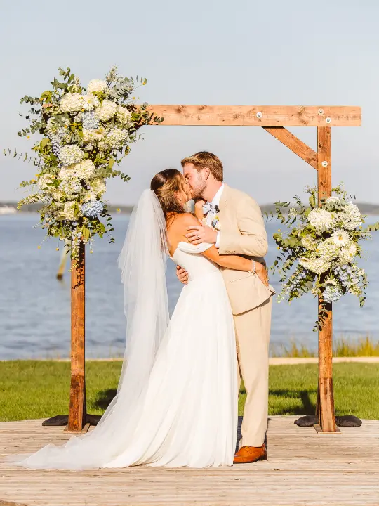 whiteandbluefloralarch Mostly white with touches of pale blue floral arch pieces