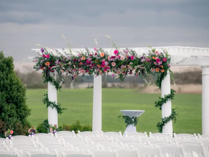 whitearchwithbouncyflorals White arch with bouncy bright florals