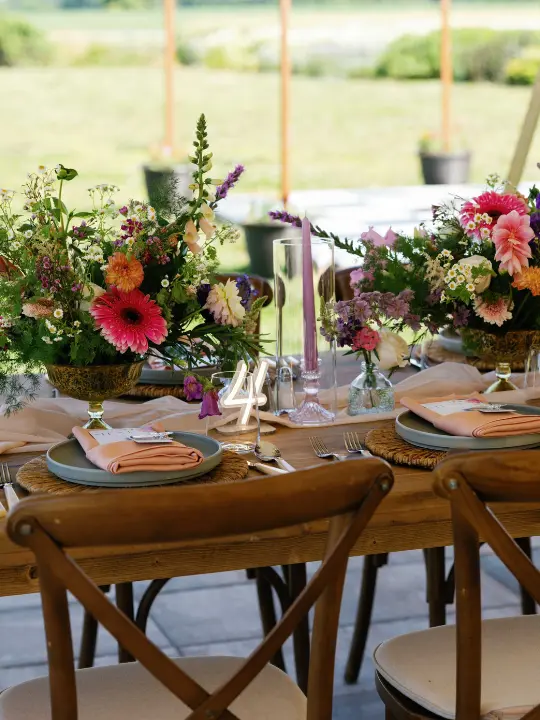 bright-wild-floral-arrangement Two compote arrangements brightly arranged