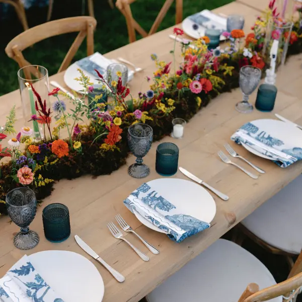 Up close view of a floral arrangement on a rectangle table