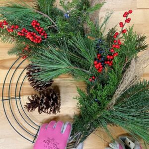 Photo shows halfway through the process of making a DIY Christmas wreath.