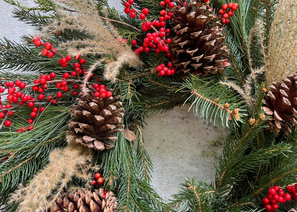 Natural Holiday Wreath with red berries by Wildly Native Flower Farm, up close
