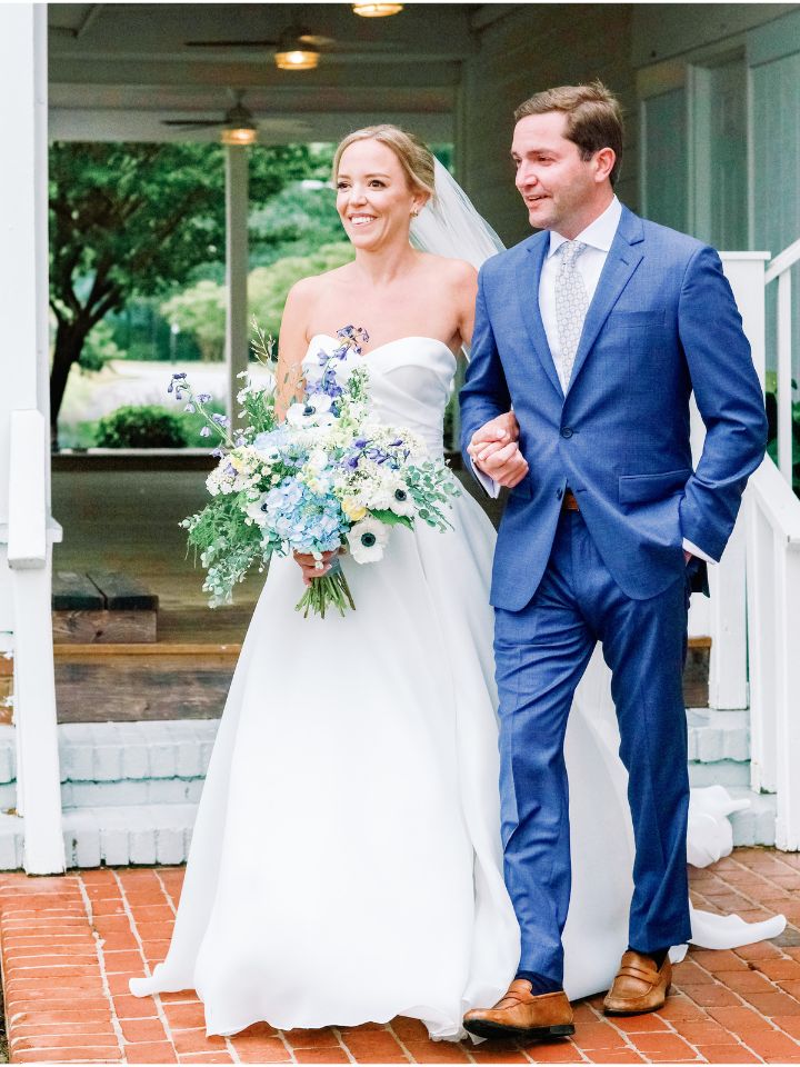 Bride walks to aisle with brother escorting her.