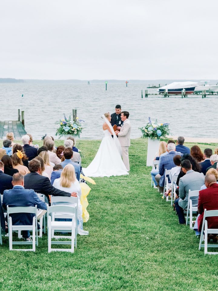 Wedding ceremony at the waterfront at the Wylder Hotel Tilghman Island.