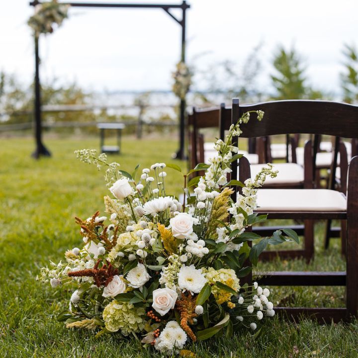 Flower arrangement in fall neutral pastels for wedding ceremony
