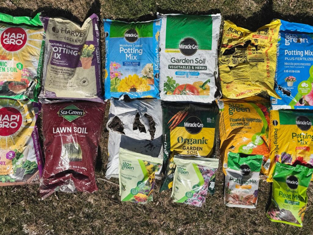 garden soil vs potting mix Bags of various storebought garden soil and potting mix blends.