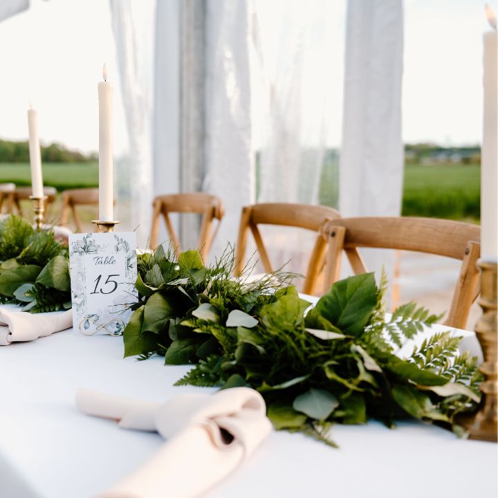greenery garland on head table.