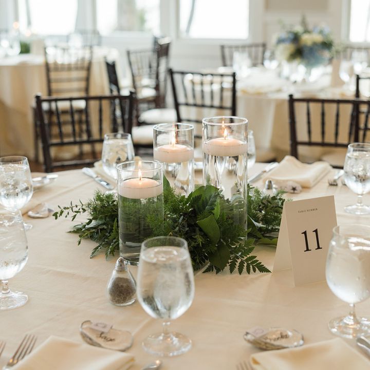 floating candles with greenery