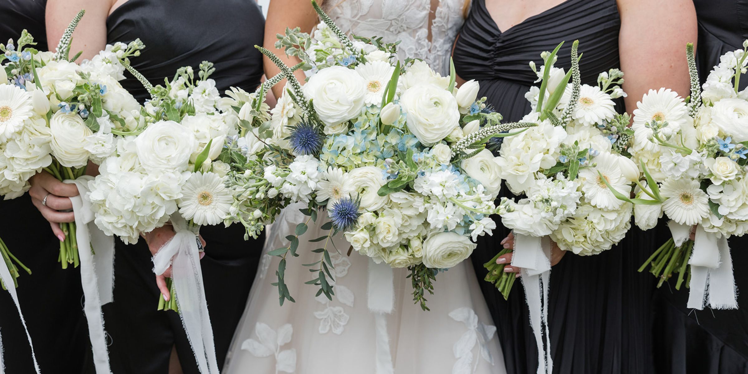 white and blue bouquets in a line