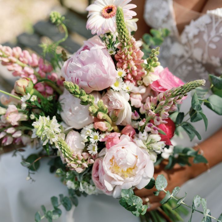 Pink and white flowers bridal bouquet.