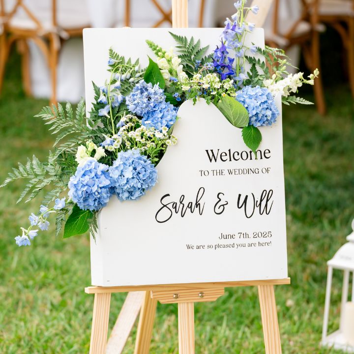 signage sq Blue and white hydrangeas in a welcome box sign