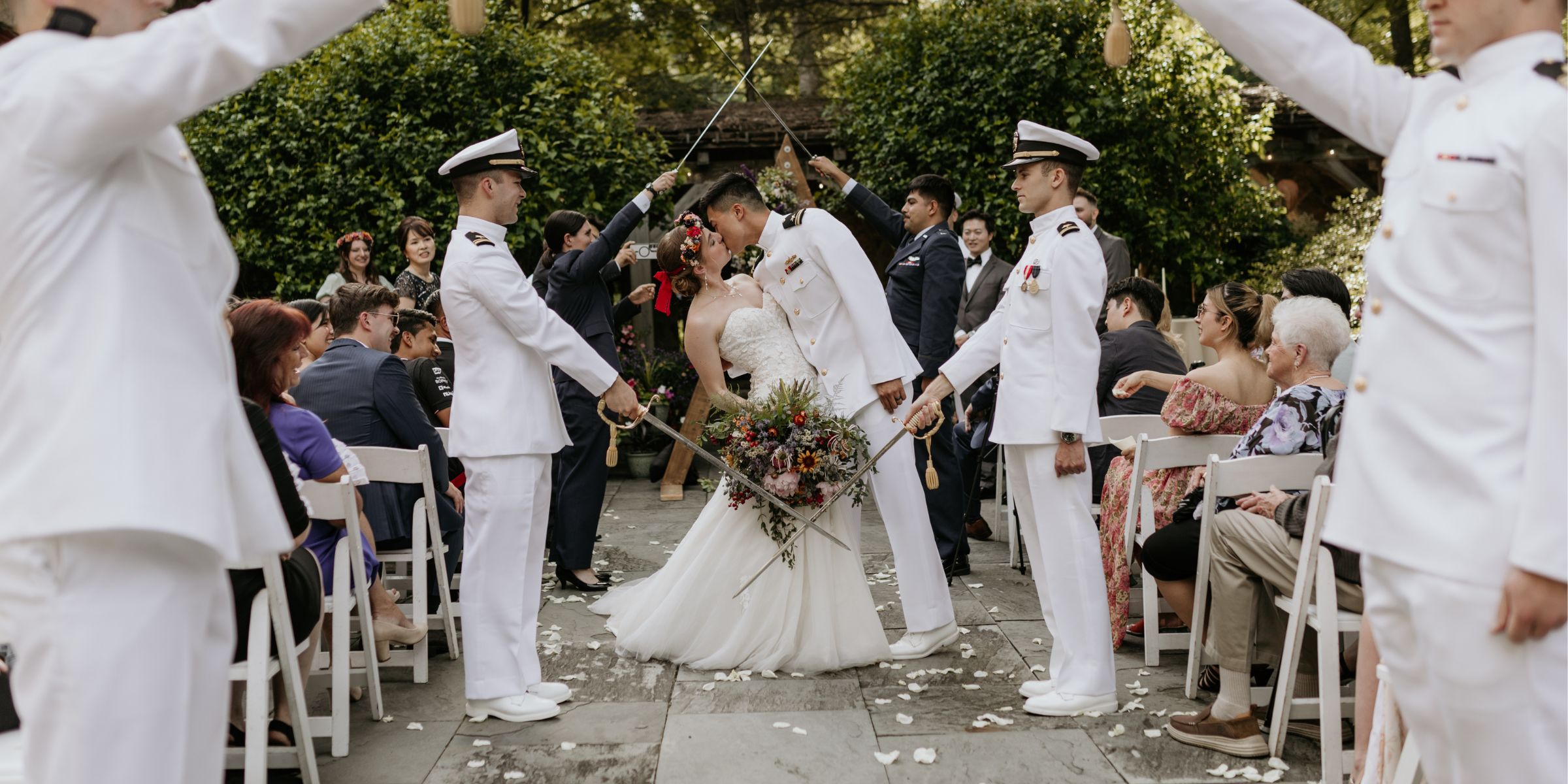 military style saber arch at wedding ceremony