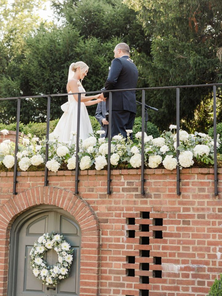Wedding ceremony at top of brick staircase.