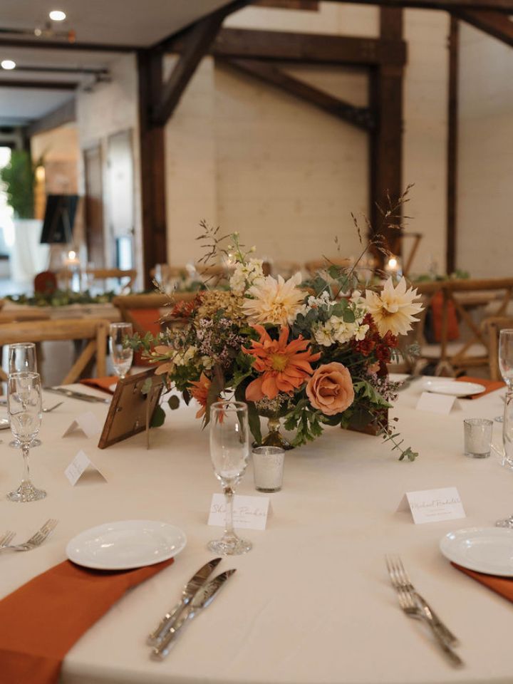 Gold compote flower arrangement centerpiece.