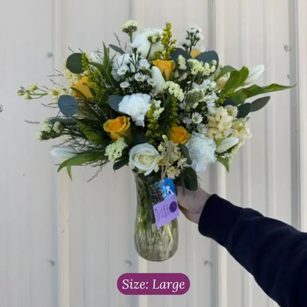 Large sympathy vase arrangement in soft colors