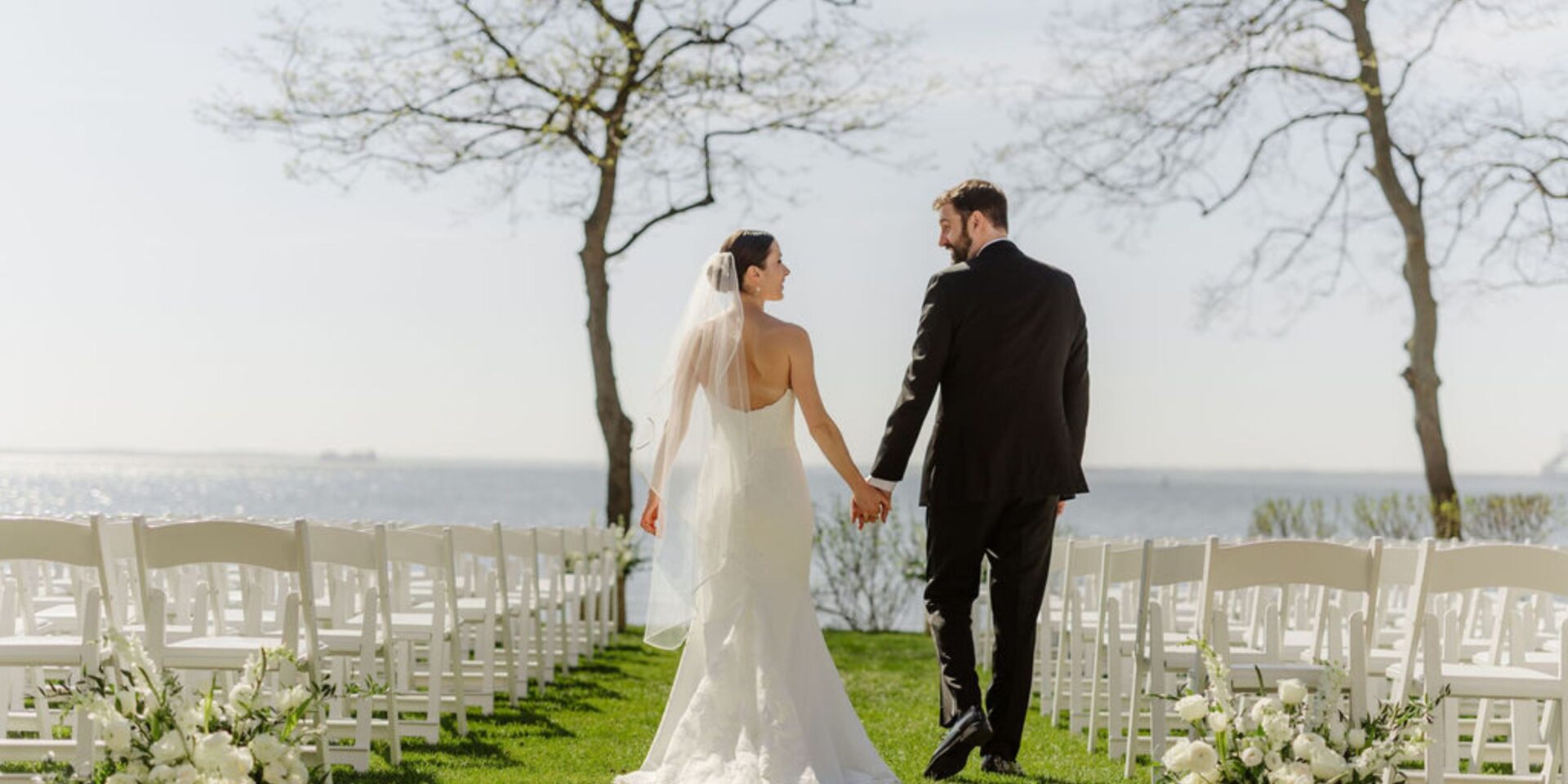 Bride and groom walk down aisle