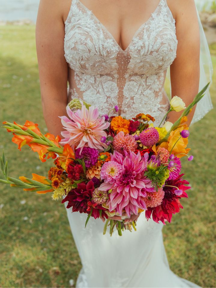 colorful dahlia bouquet Detail of bridal bouquet from a September wedding with colorful flowers.