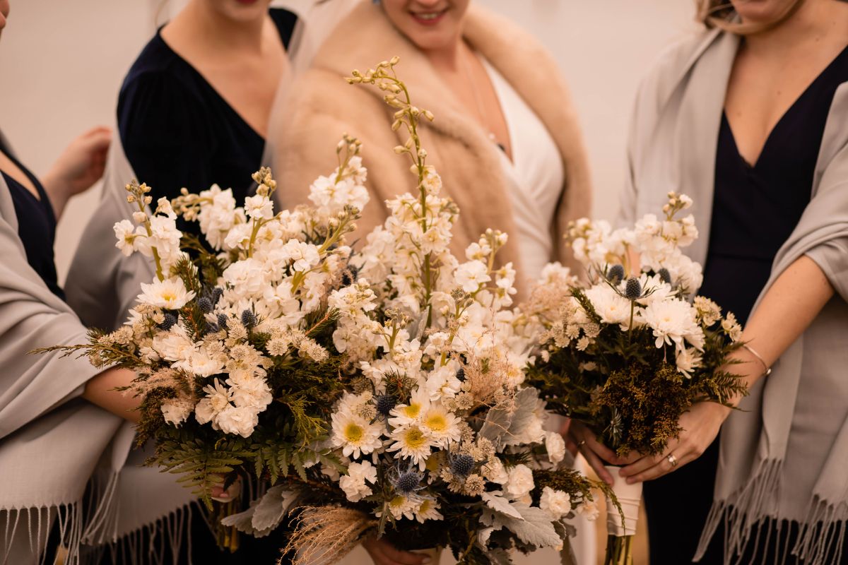 Closeup of bridal party bouquets.